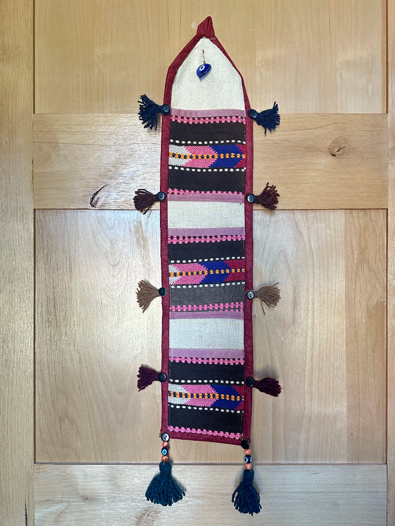 hot pink, black and maroon colored fabric 3 pocket wall organizer and accessory made from turkish rug fragments