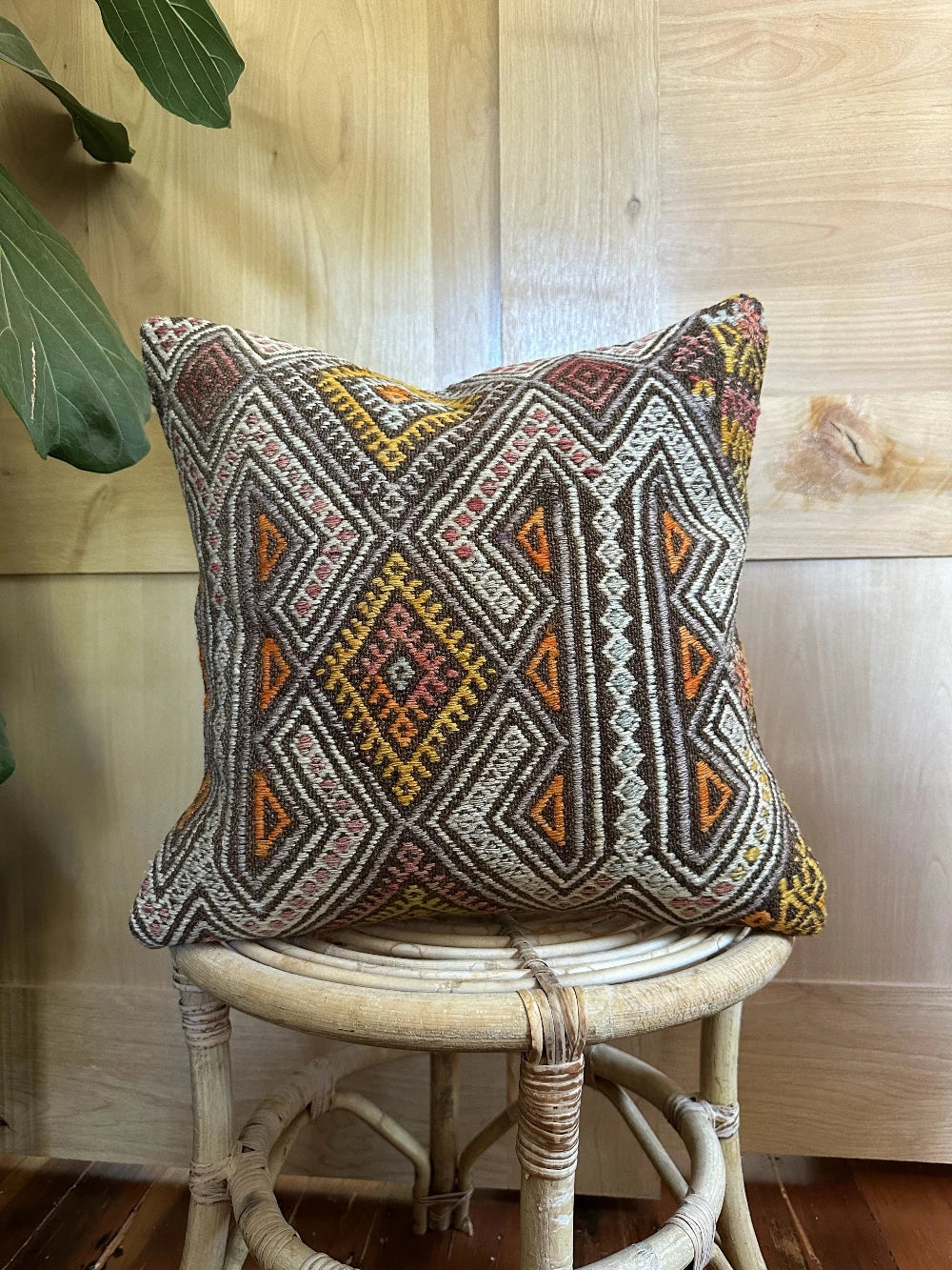 15 by 15 multicolored embroidered turkish throw pillow featuring a brown background color and geometric design