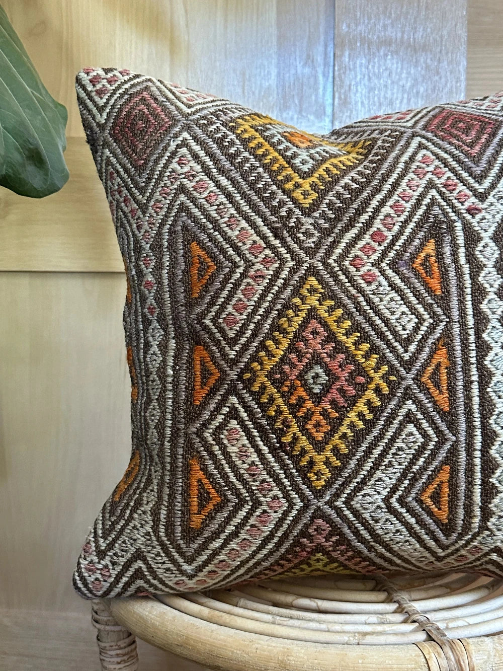 15 by 15 multicolored embroidered turkish throw pillow featuring a brown background color and geometric design
