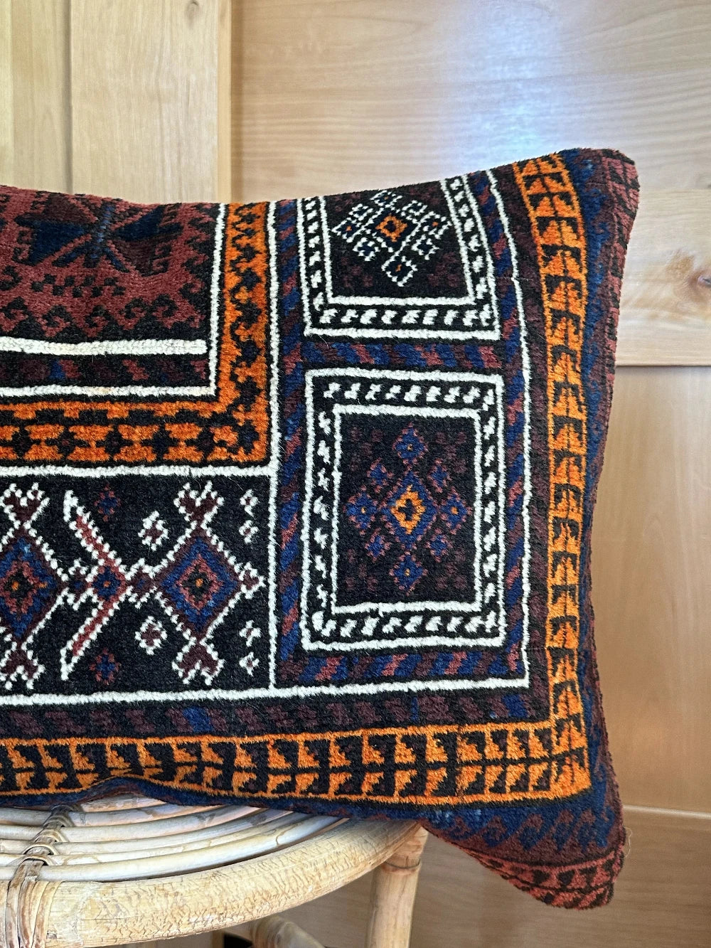 16 x 24 dark purple and navy blue lumbar pillow featuring geometric pattern