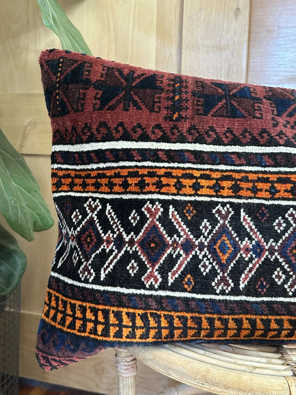 16 x 24 dark purple and navy blue lumbar pillow featuring geometric pattern