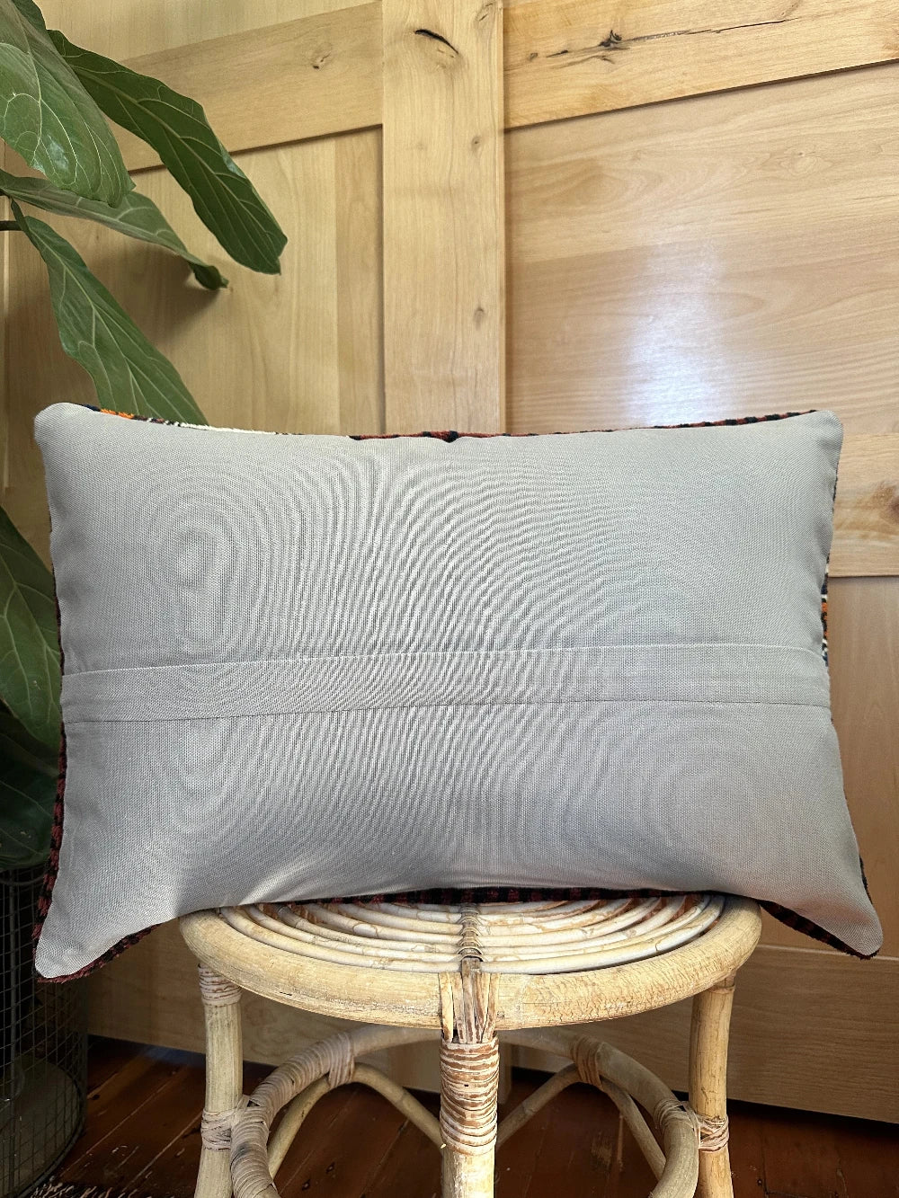 16 x 24 dark purple and navy blue lumbar pillow featuring geometric pattern