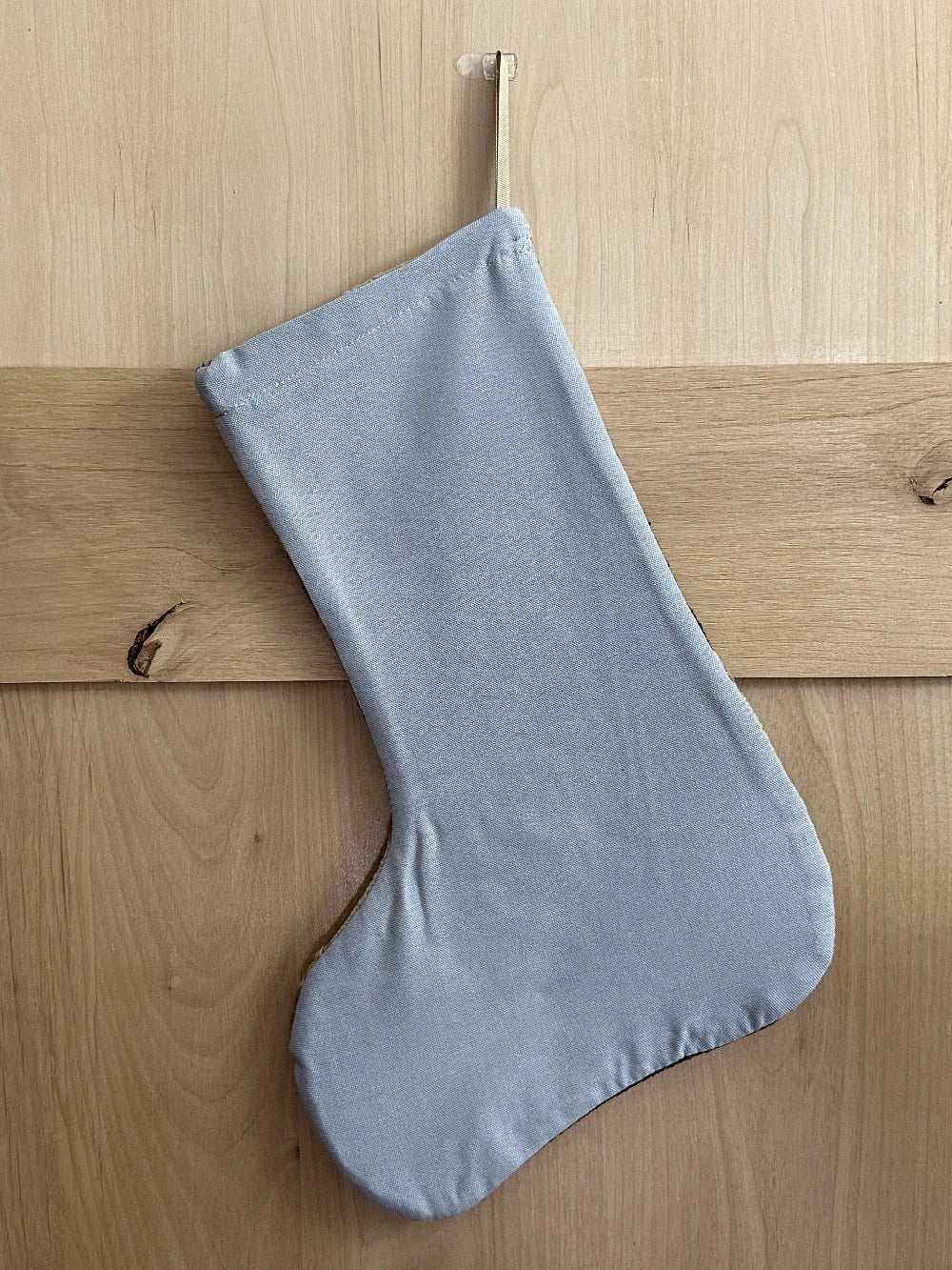 brown and cream striped Christmas Turkish stocking featuring light pink embroidery