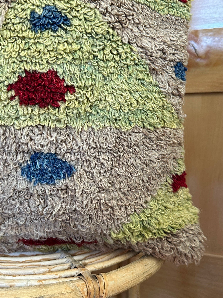 Hand-knotted, shaggy purple and green Turkish throw pillow, 20x20 inches, wool front with geometric design and pops of blue and maroon, cotton backing—boho home decor.