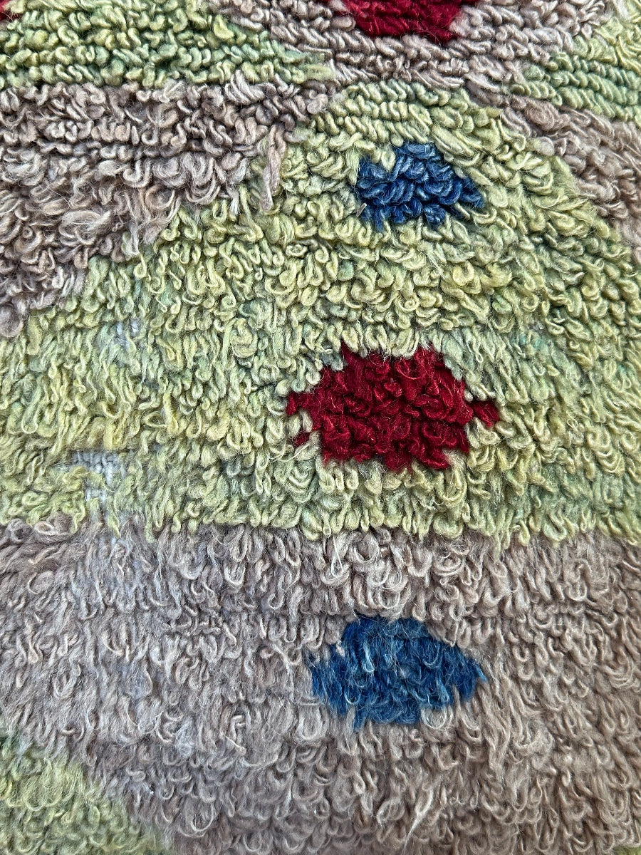 Hand-knotted, shaggy purple and green Turkish throw pillow, 20x20 inches, wool front with geometric design and pops of blue and maroon, cotton backing—boho home decor.