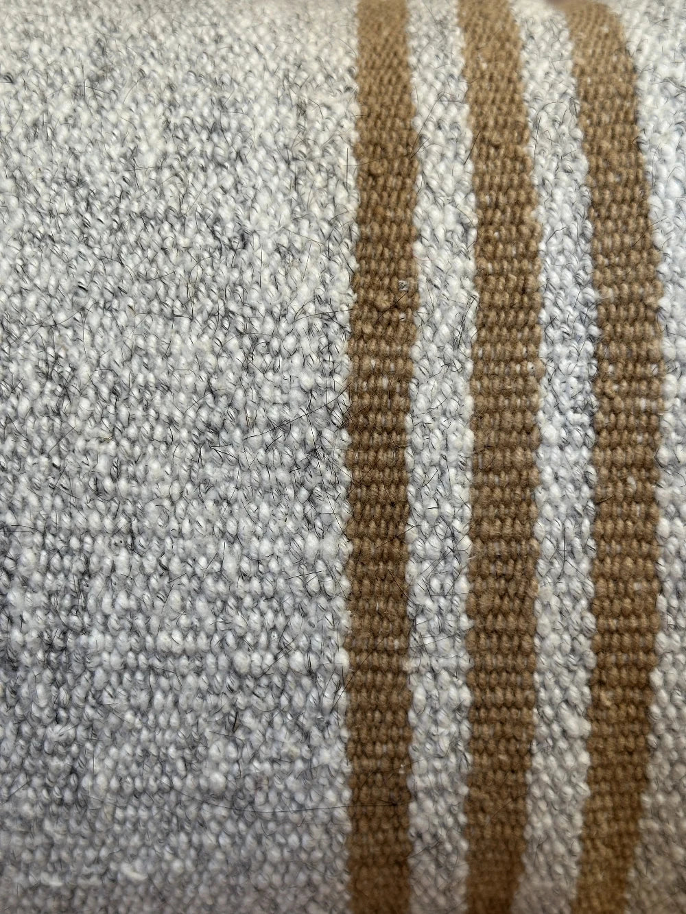 12 by 24 small neutral striped lumbar pillow featuring a striped pattern in three sections