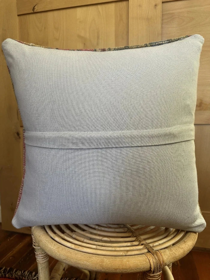18 by 18 neutral floral pile pillow with pops of light pink, yellow and cream