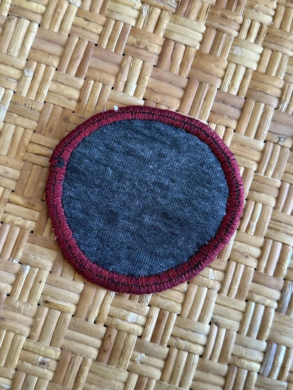 Turkish coaster set measuring 3.75 inches featuring a white and orange geometric print