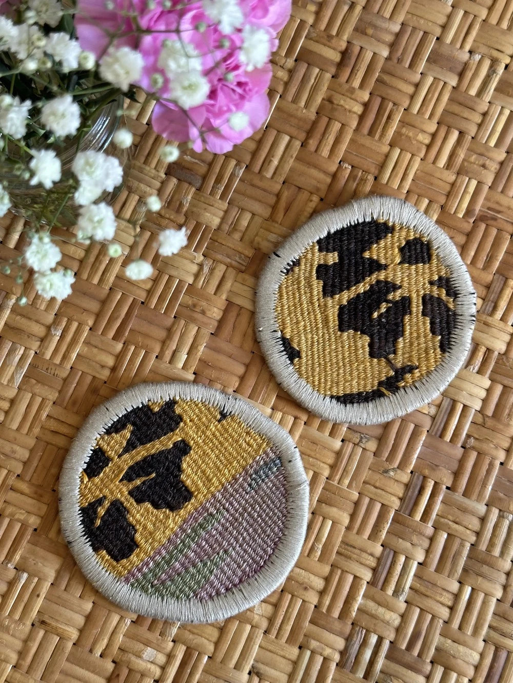 Upcycled Turkish coaster fabric coaster set featuring a colorful and geometric floral pattern measuring 3.75 inches
