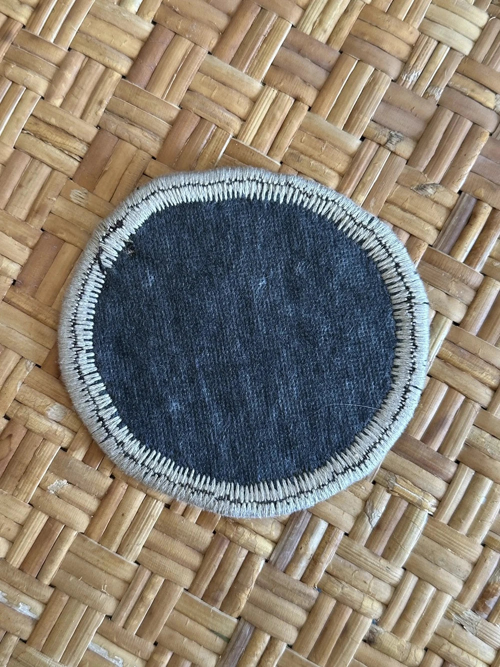 Upcycled Turkish coaster fabric coaster set featuring a colorful and geometric floral pattern measuring 3.75 inches