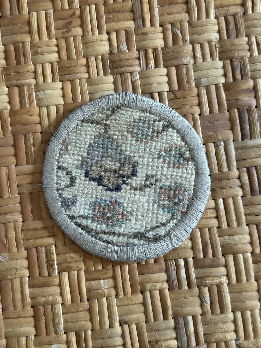3.75 inches in diameter Turkish rug coasters upcycled and made from scraps of Turkish rugs featuring a neutral floral design