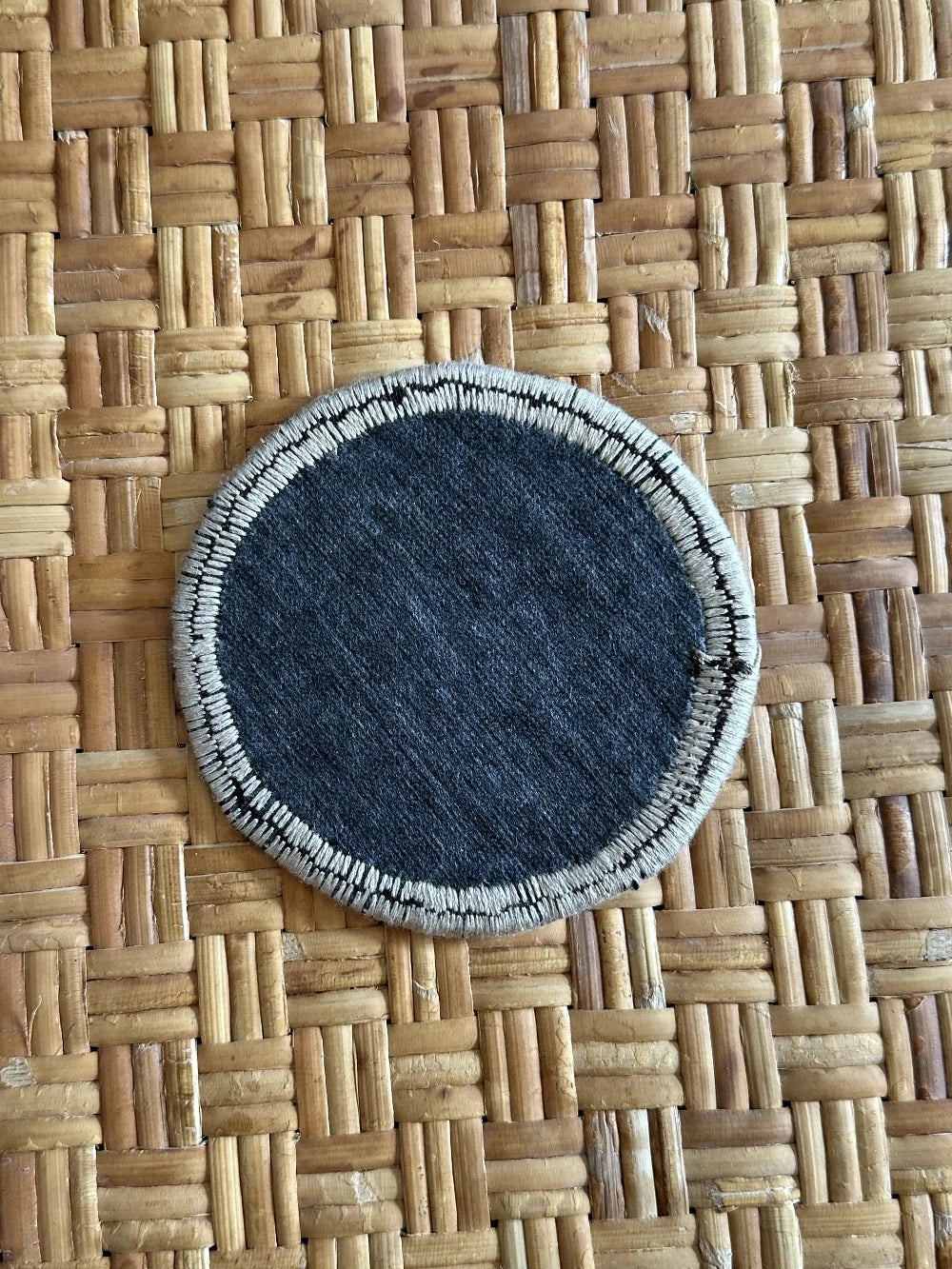 3.75 inches in diameter Turkish rug coasters upcycled and made from scraps of Turkish rugs featuring a neutral floral design
