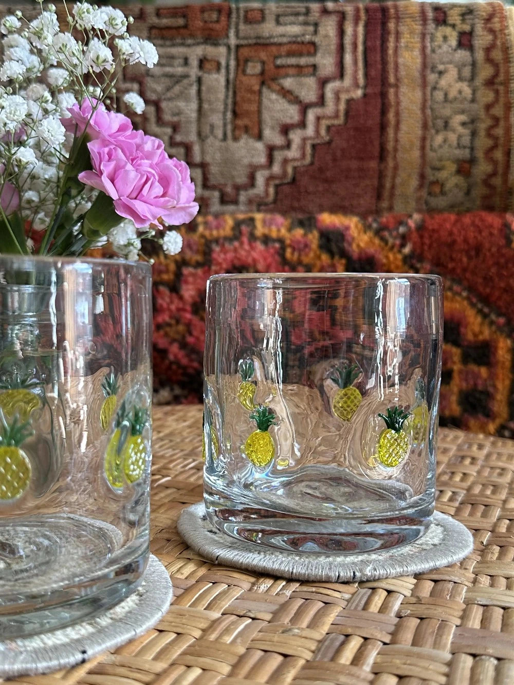 3.75 inches in diameter Turkish rug coasters upcycled and made from scraps of Turkish rugs featuring a neutral floral design