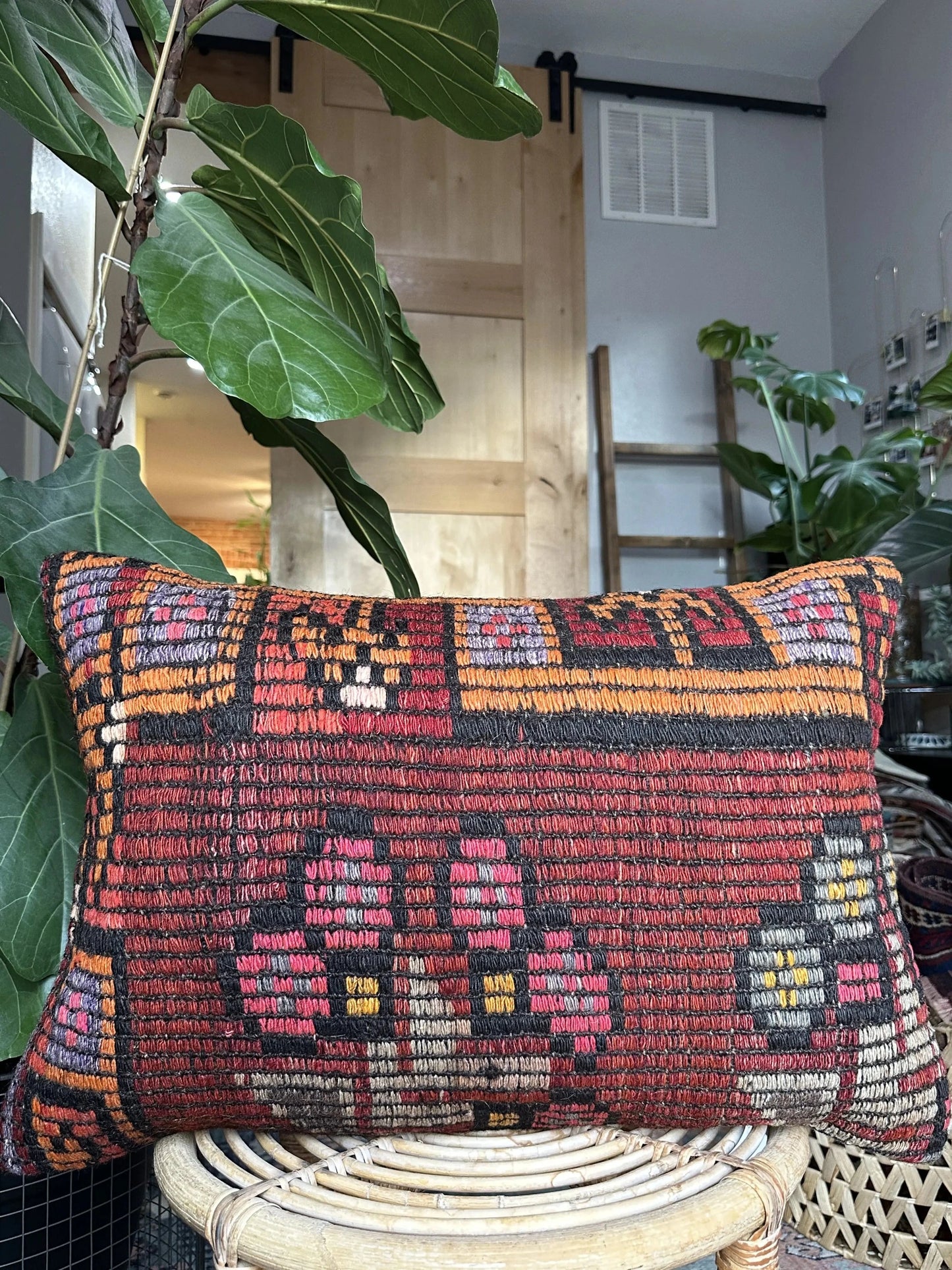 16 by 24 red embroidered Turkish lumbar pillow featuring floral pattern