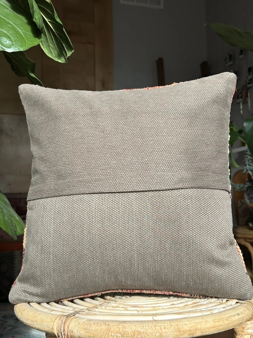 16 by 16 Turkish throw pillow featuring soft pile material and beautiful muted pink and yellow muted tones and a geometric pattern on one side upcycled from a Turkish rug