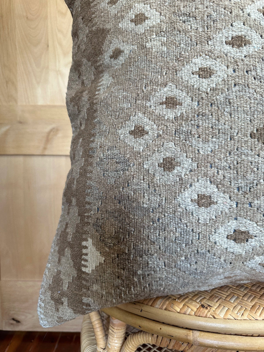 Handwoven neutral Turkish throw pillow, 26x26 inches, wool front with repeating geometric design, cotton backing—boho home decor.