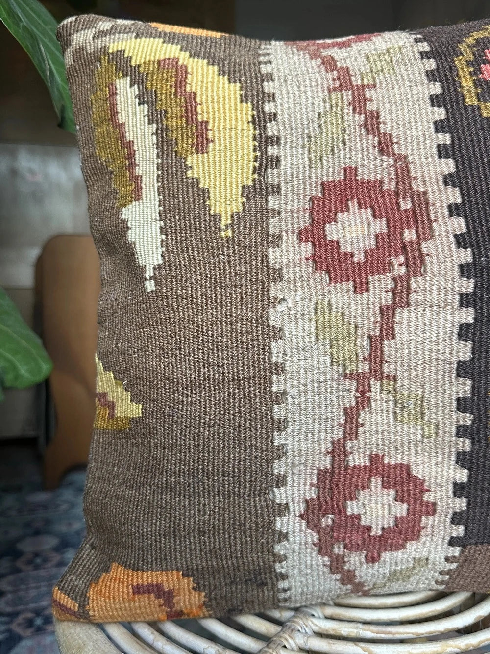15 by 15 neutral Turkish throw pillow featuring muted tones and a beautiful floral pattern upcycled from an old Turkish rug