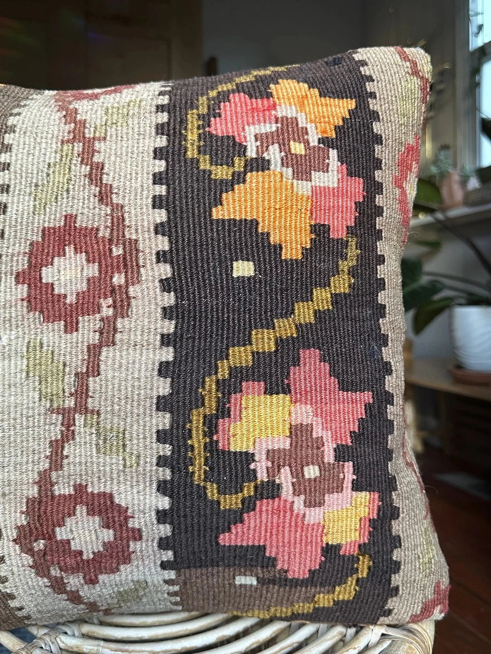 15 by 15 neutral Turkish throw pillow featuring muted tones and a beautiful floral pattern upcycled from an old Turkish rug