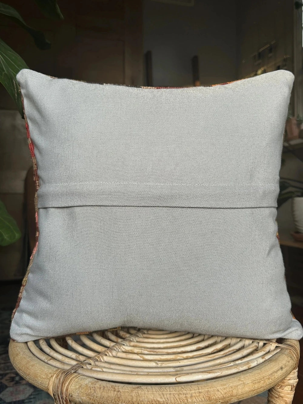 15 by 15 neutral Turkish throw pillow featuring muted tones and a beautiful floral pattern upcycled from an old Turkish rug
