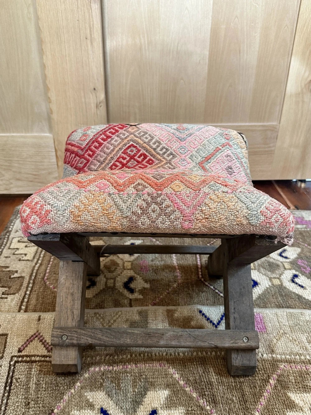 14 by 14 by 14 hand-carved Turkish tea house stools featuring recycled turkish rugs as seat covers