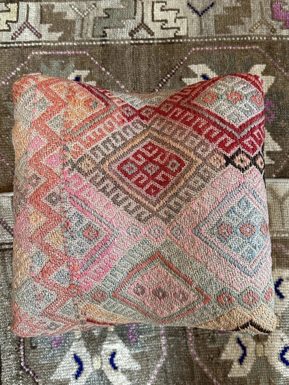 14 by 14 by 14 hand-carved Turkish tea house stools featuring recycled turkish rugs as seat covers