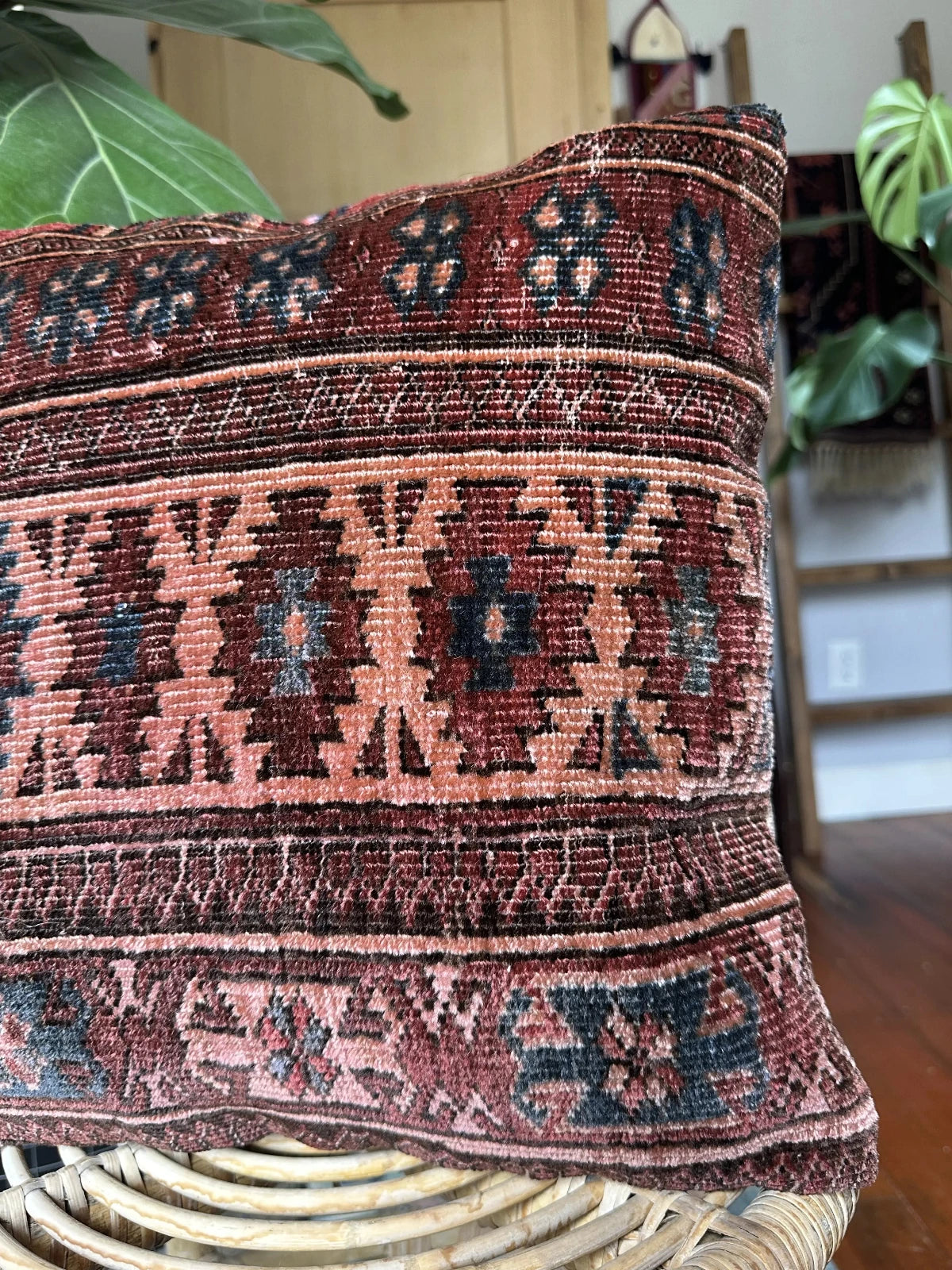 16 by 16 inch handmade Turkish throw pillow featuring a striped geometric pattern and coloring includes navy, merlot and baby pink