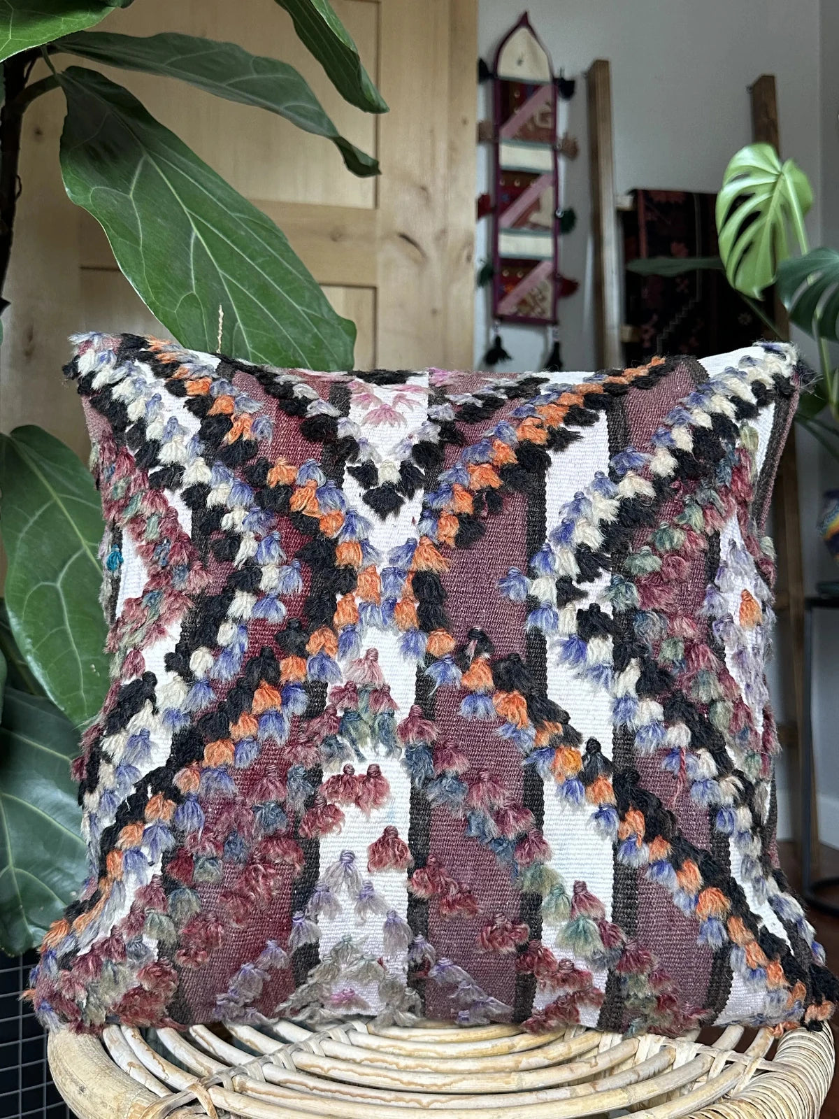 16 by 16 handmade Turkish throw pillow, featuring a purple and white stripped pattern and diamond pattern with long fringe wool