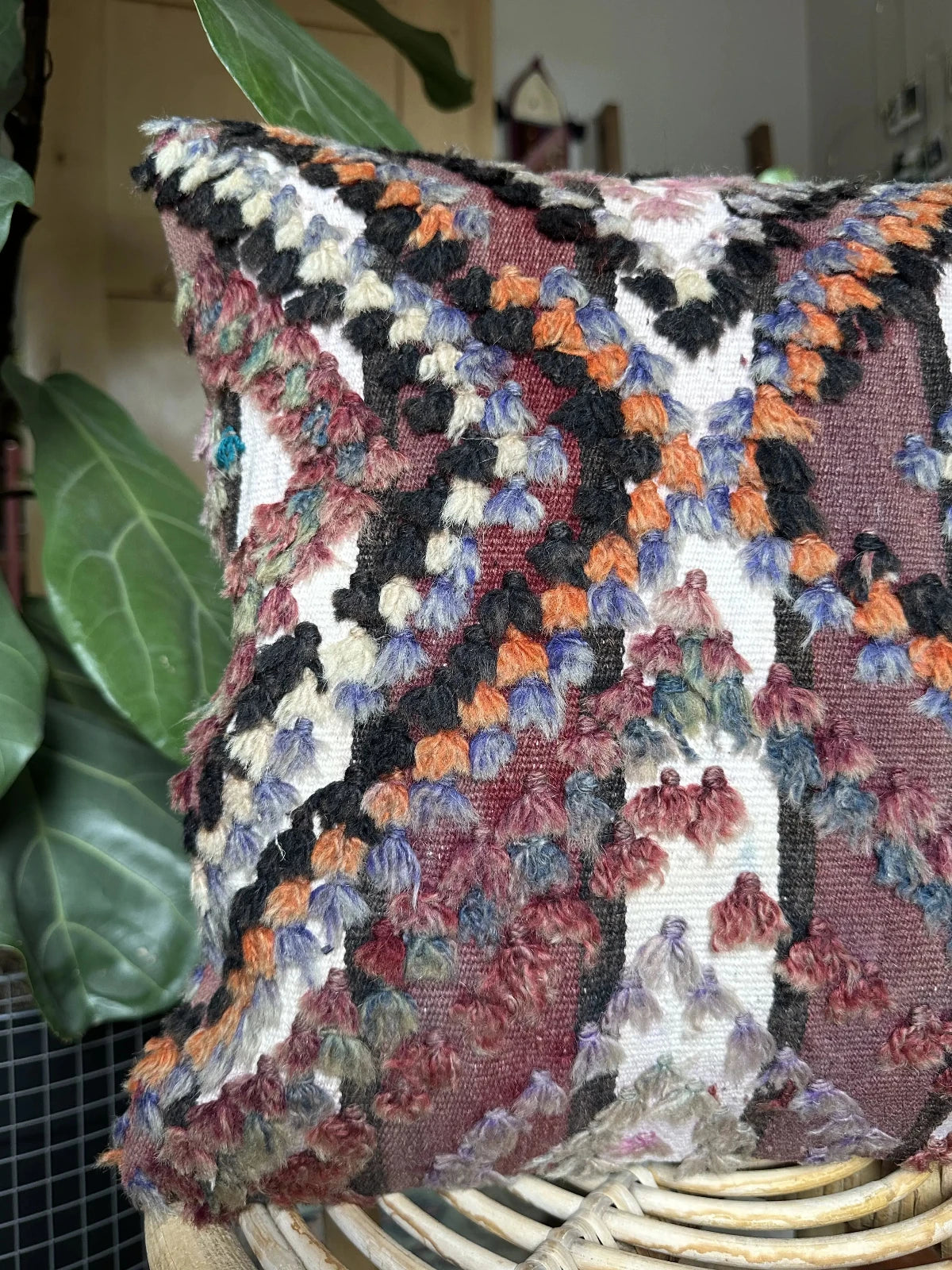 16 by 16 handmade Turkish throw pillow, featuring a purple and white stripped pattern and diamond pattern with long fringe wool