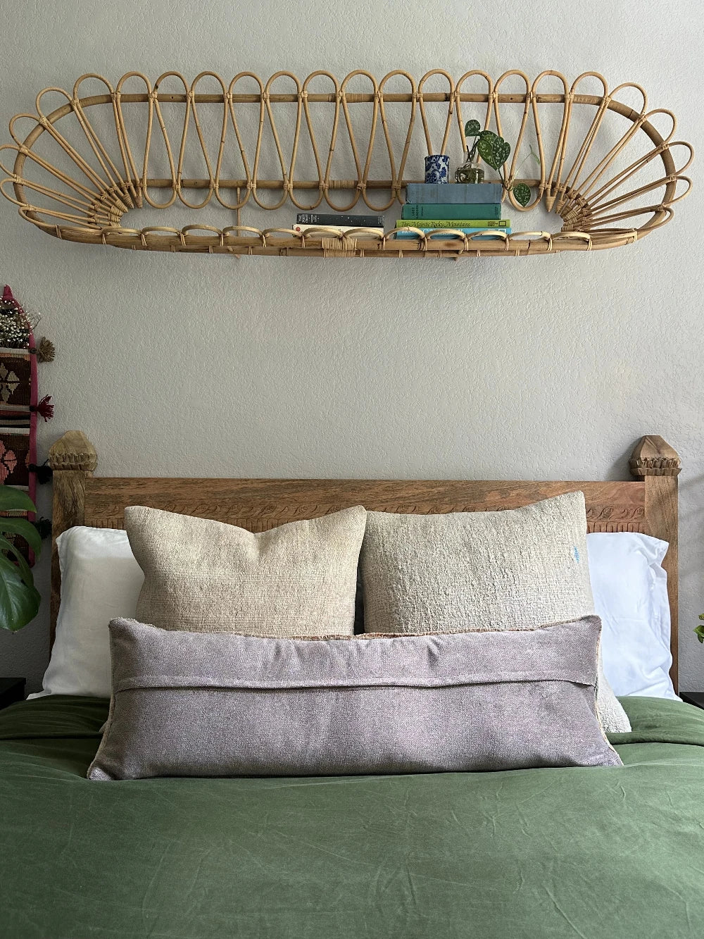 12 by 36 handmade Turkish lumbar pillow featuring floral and geometric designs and salmon, teal and sand coloring