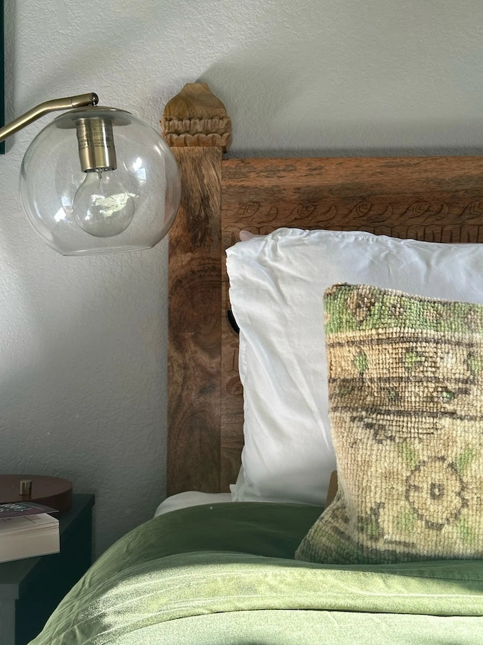 12x47 Turkish neutral lumbar pillow featuring warm neutral ones and pops of olive and light green