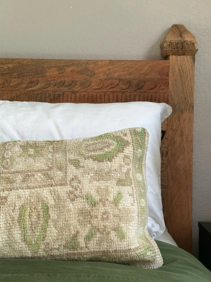 12x47 Turkish neutral lumbar pillow featuring warm neutral ones and pops of olive and light green