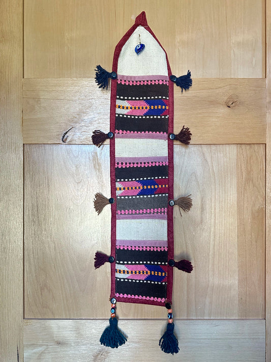 hot pink, black and maroon colored fabric 3 pocket wall organizer and accessory made from turkish rug fragments