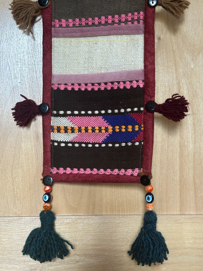 hot pink, black and maroon colored fabric 3 pocket wall organizer and accessory made from turkish rug fragments