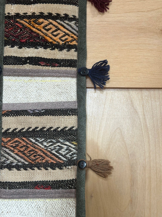 taupe, orange and olive green colored fabric 3 pocket wall organizer and accessory made from turkish rug fragments