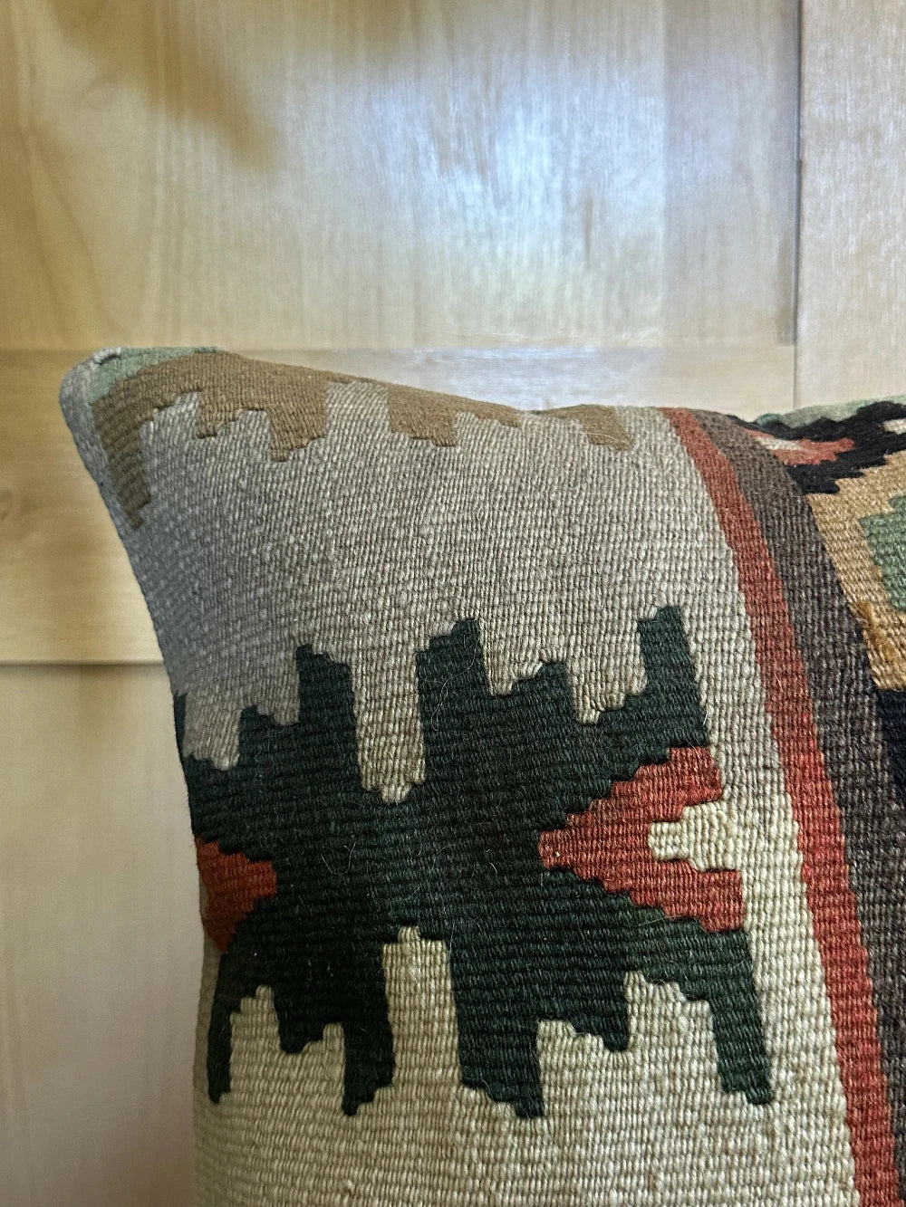 16 by 16 geometric turkish throw pillow featuring pops of dark green, rust and robins egg blue