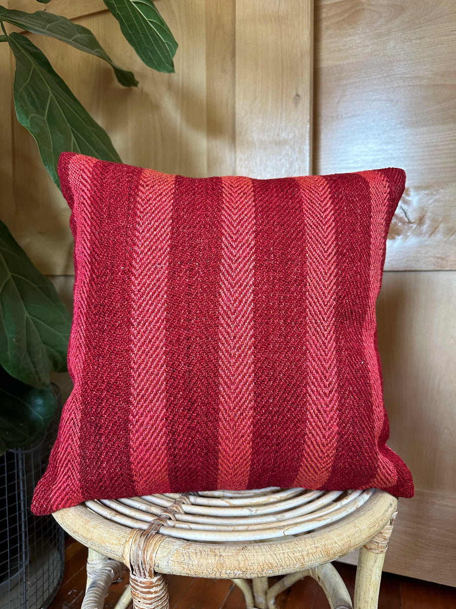 Handwoven red and pink striped Turkish throw pillow, 16x16 inches, wool with cotton backing—boho home decor.