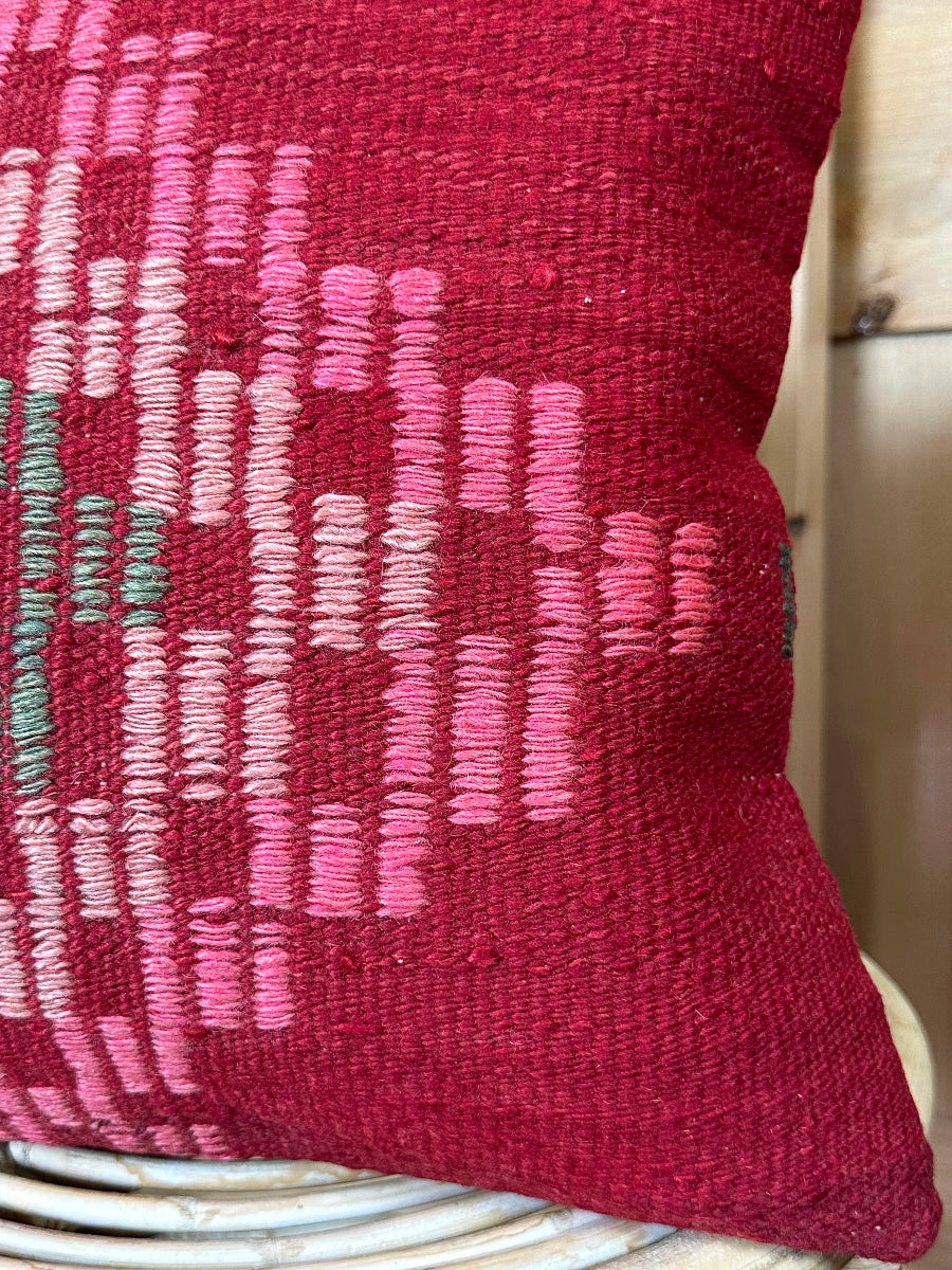 Handwoven red and pink Turkish throw pillow, 16x16 inches, wool front with geometric design, cotton backing—boho home decor.