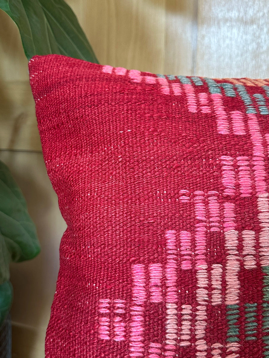 Handwoven red and pink Turkish throw pillow, 16x16 inches, wool front with geometric design, cotton backing—boho home decor.