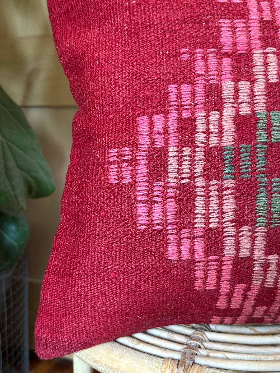 Handwoven red and pink Turkish throw pillow, 16x16 inches, wool front with geometric design, cotton backing—boho home decor.