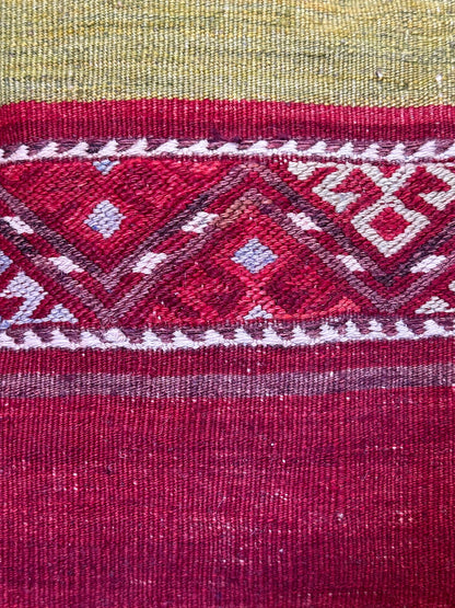 Handwoven red and green Turkish throw pillow, 20x20 inches, wool front with striped design and pops of white and pink, cotton backing—boho home decor.