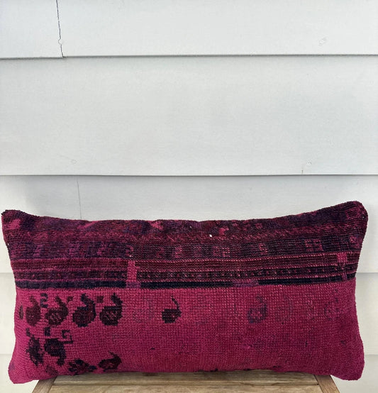 12 by 24 inch hot pink lumbar pillow featuring a floral design