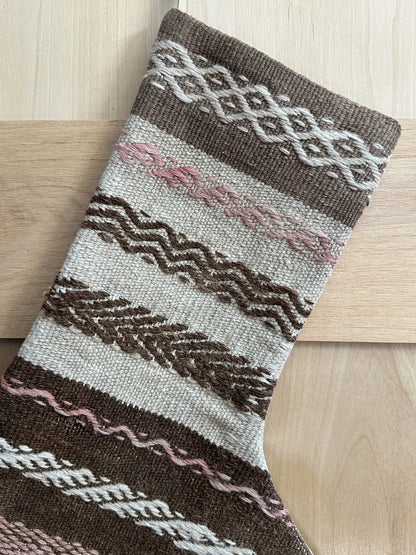 brown and tan striped handmade Turkish Christmas stocking with pink woven stripes throughout