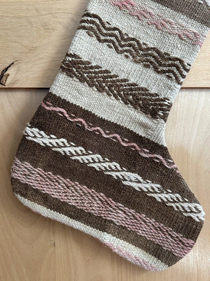 brown and tan striped handmade Turkish Christmas stocking with pink woven stripes throughout