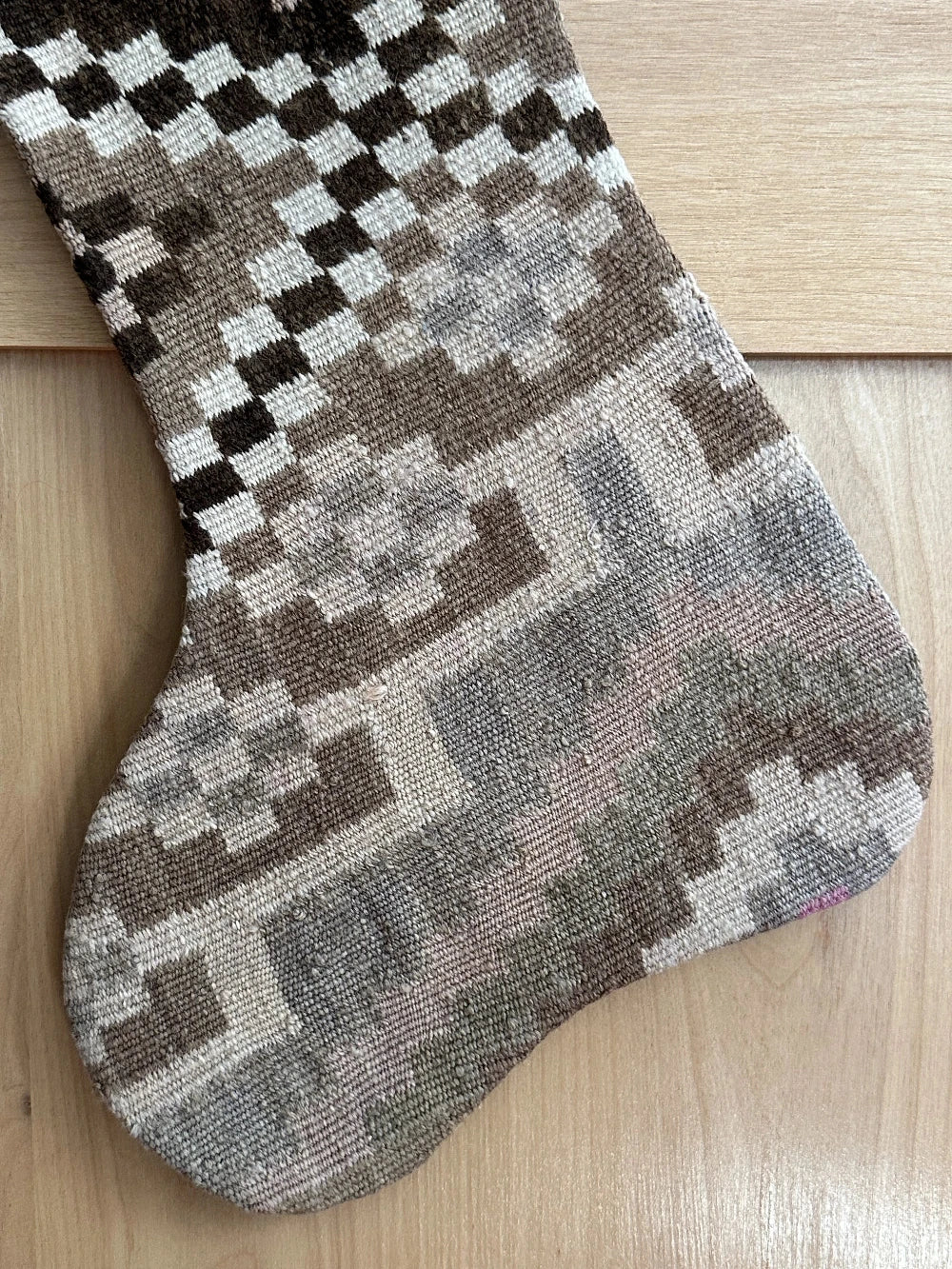 brown and cream handmade Turkish Christmas stocking featuring checkered lines and other geometric shapes