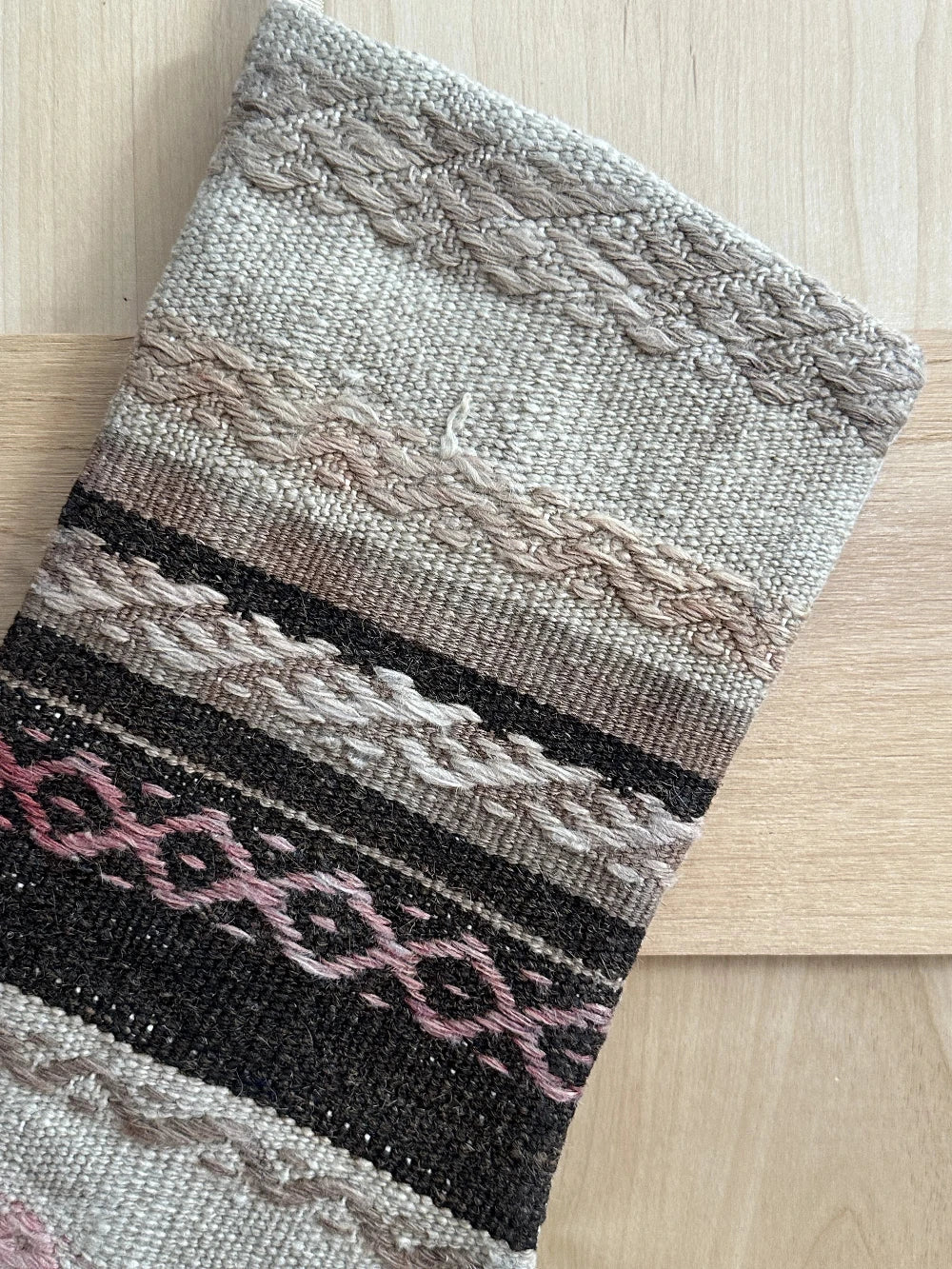 brown and cream striped Christmas Turkish stocking featuring light pink embroidery