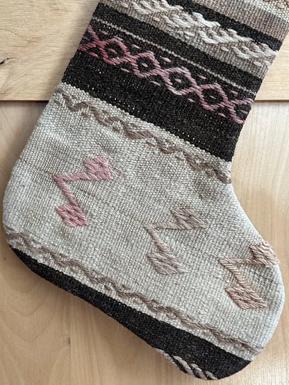 brown and cream striped Christmas Turkish stocking featuring light pink embroidery