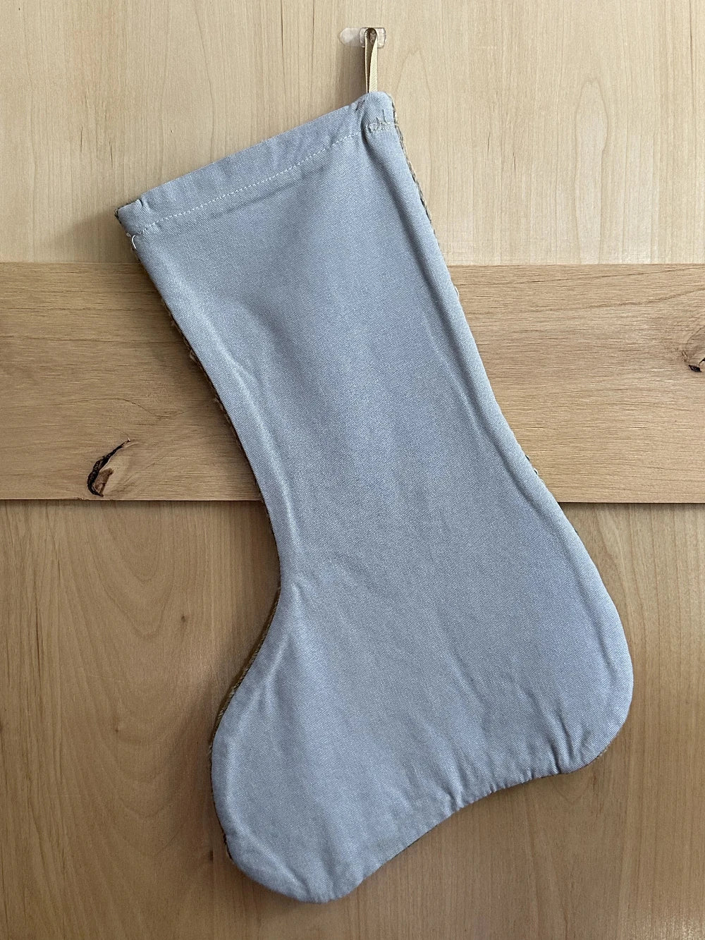 light blue and cream handmade Turkish  Christmas stocking featuring faint embroidered design