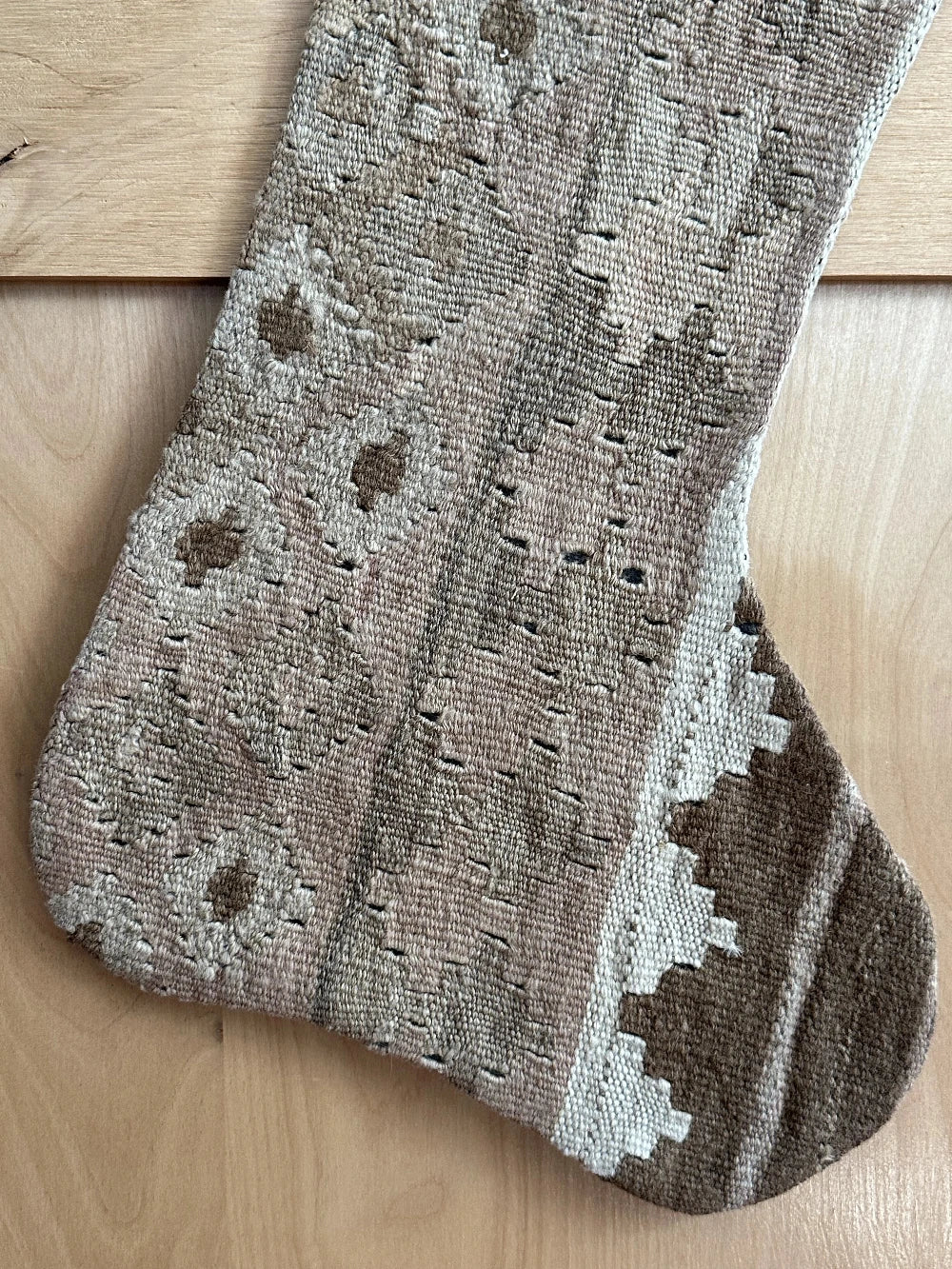 Beige and cream handmade Turkish Christmas stocking featuring geometric designs throughout