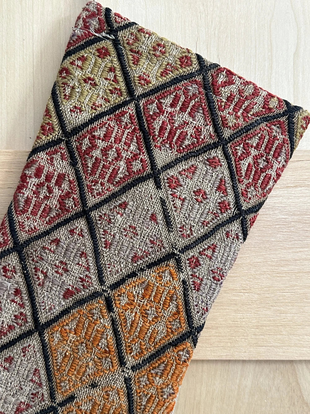 colorful handmade Turkish Christmas stocking featuring a checkered quilted pattern