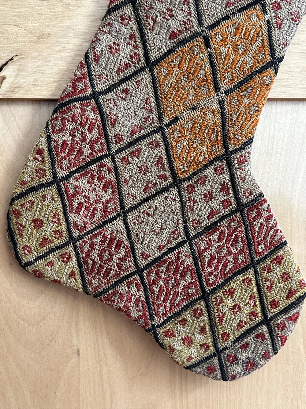 colorful handmade Turkish Christmas stocking featuring a checkered quilted pattern